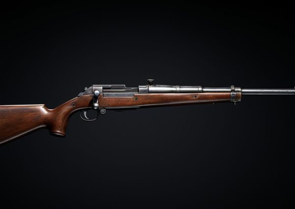 close up shotgun showcased black background (1)